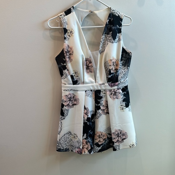 White with black and purple flower romper - Picture 1 of 5